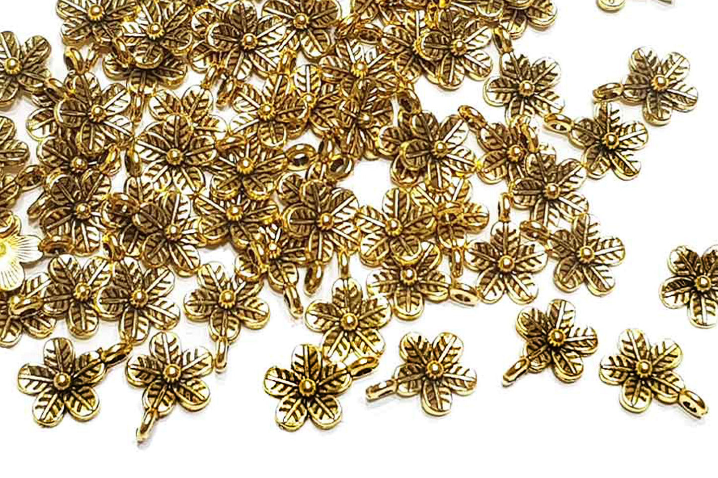 Golden Color Flower shape Metal Charms Package of 100 grams