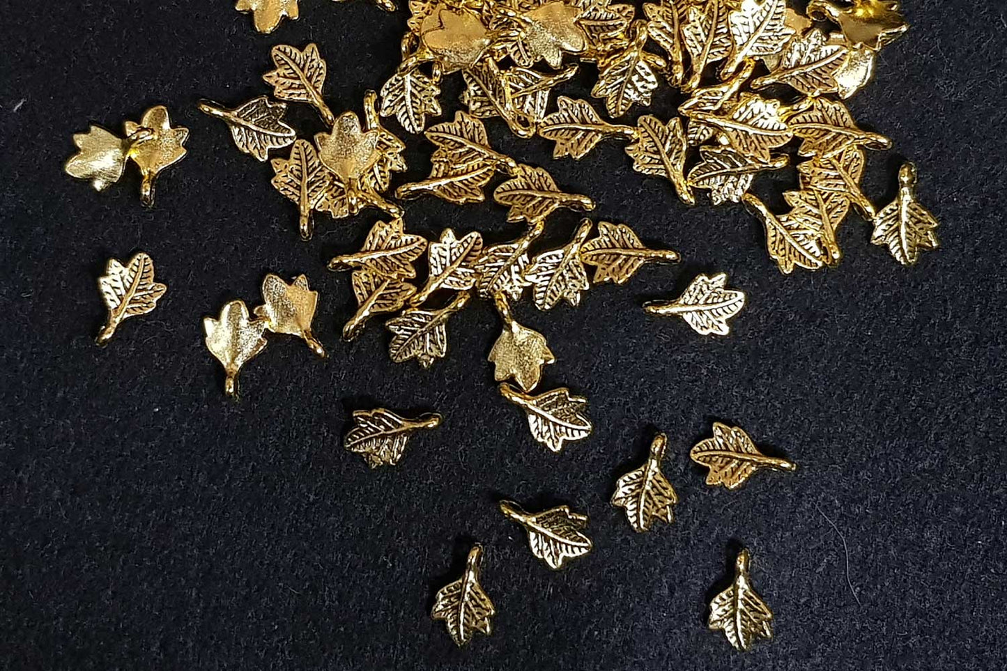 Golden Mehandi Polish Maple Leaf Shape Metal Charms Package of 100 grams