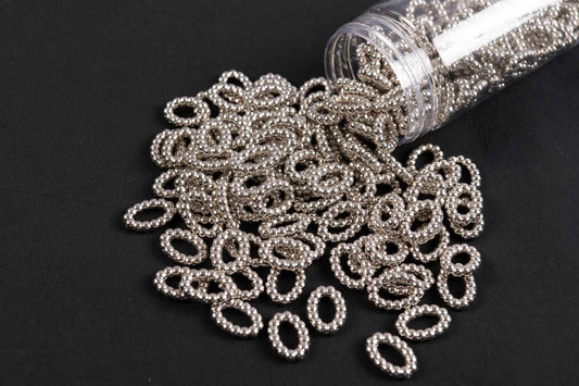 Silver Color Oval Shape Plastic Beads Package of 50 Grams